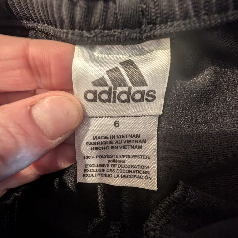 Red Apparel with Black Accents - Picture 4 of 5